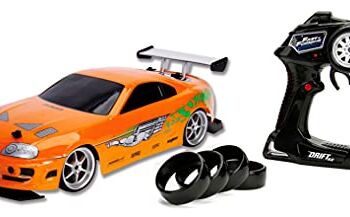 Jada Toys Fast & Furious RC-Auto, Drift 1995 Toyota Supra, Turbo, funkcja Drift, 4 koła, samochód zdalnie sterowany, 2-kanałowy, funkcja ładowania USB, 4 zapasowe opony, 1:10, pomarańczowy